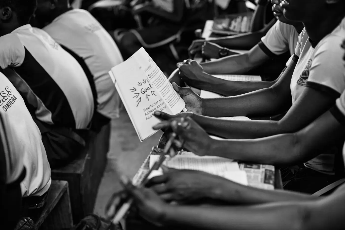 Students reading and writing during an academic session